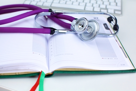 journal and stethoscope